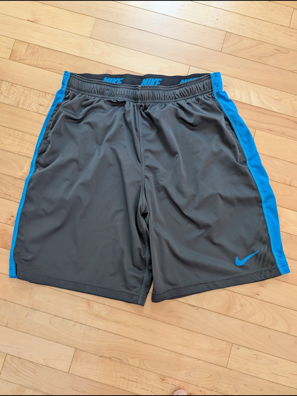 Nike Men’s Gray Athletic Shorts with Blue Accents
